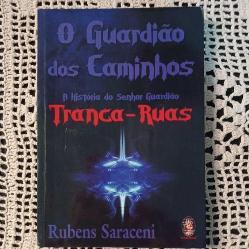 O GUARDIÃO DOS CAMINHOS A HISTÓRIA DO SENHOR GUARDIÃO TRANCA-RUAS. RUBENS SARACENI. ROMANCE ESPÍRITA