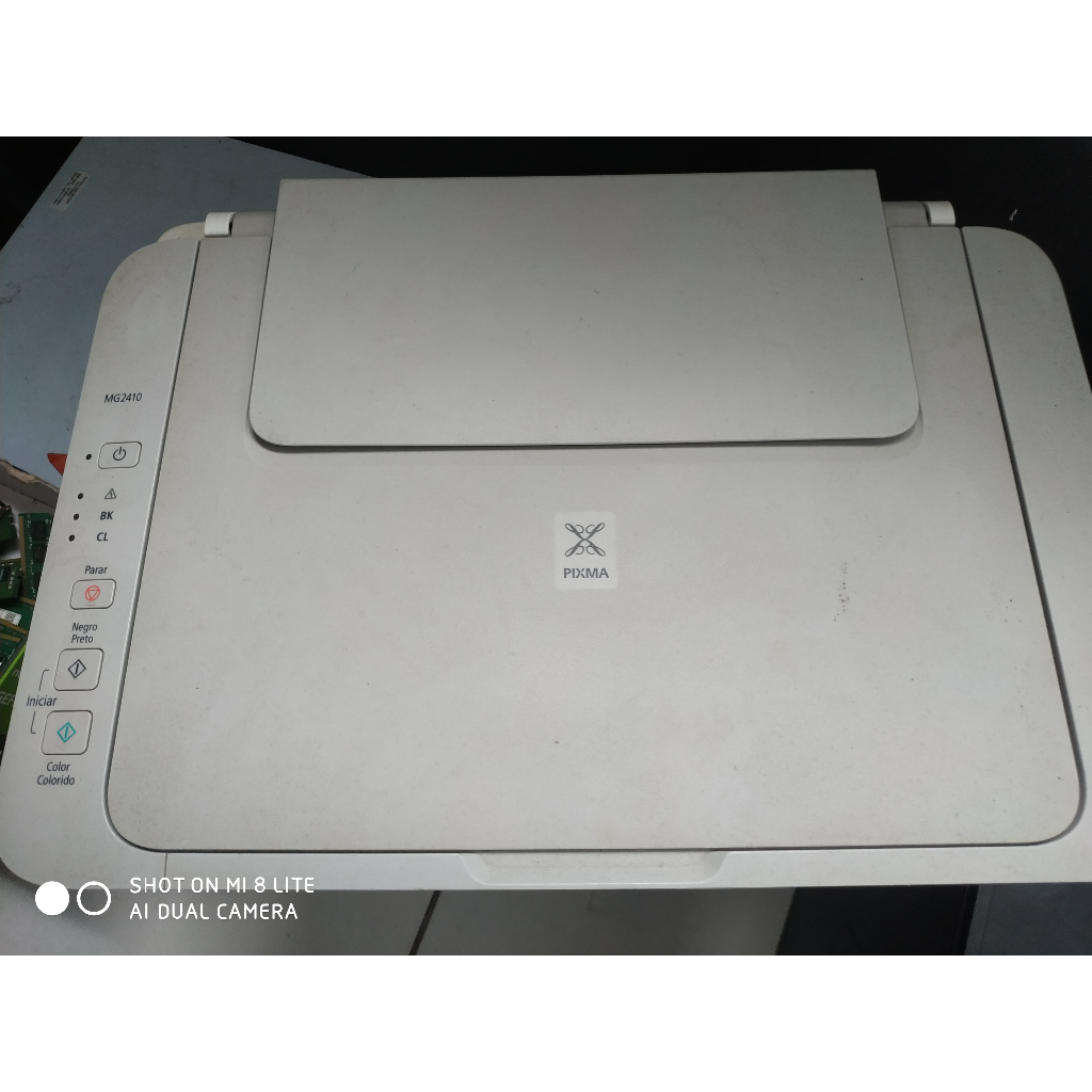 IMPRESSORA CANON MG2410 COM DEFEITO