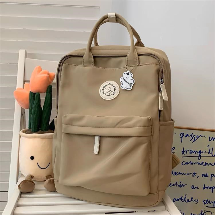 Mochila Feminina Escolar Universitária De Viagem Moda Casual Unissex X007 em Oferta na Shopee