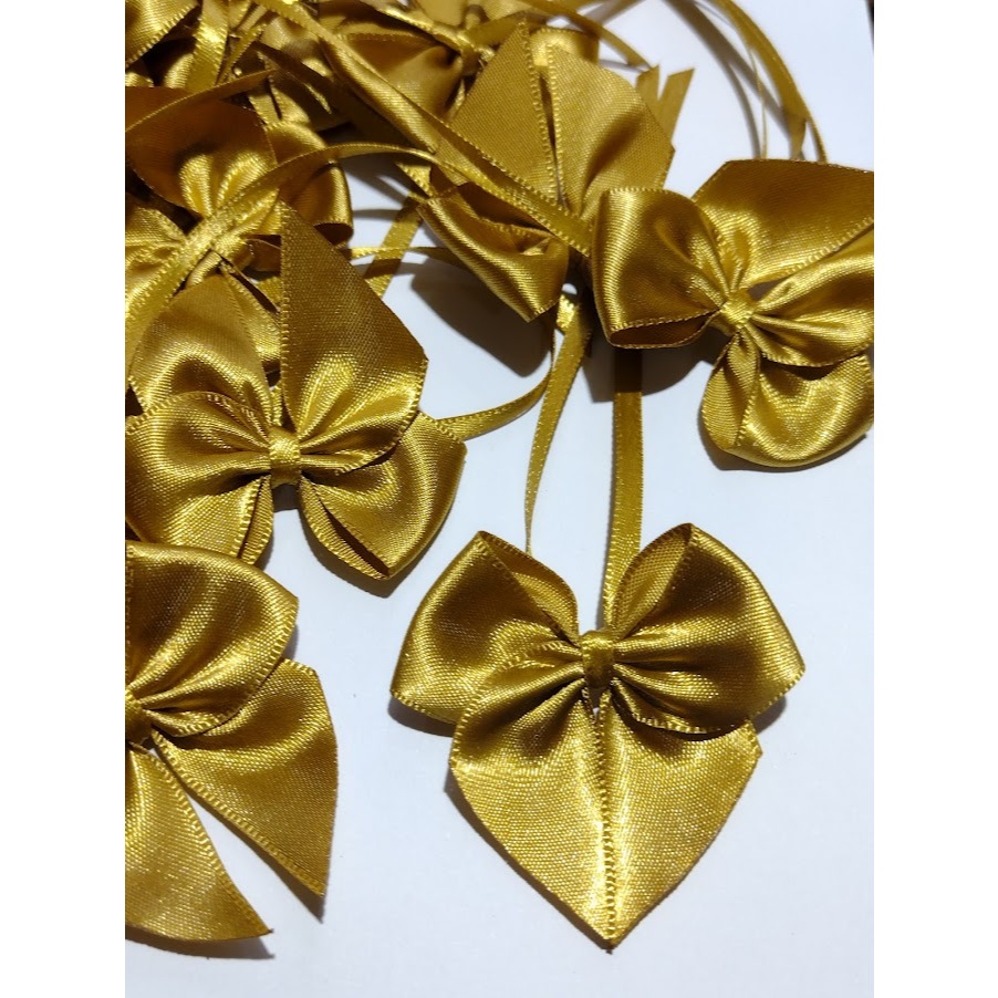 Laço de Cetim 5x5 cm com fita para amarração - 50 unidades - Decorações doces, bolas e esferas acrílicas, caixa milk, personalizados e lembrancinhas em Oferta na Shopee