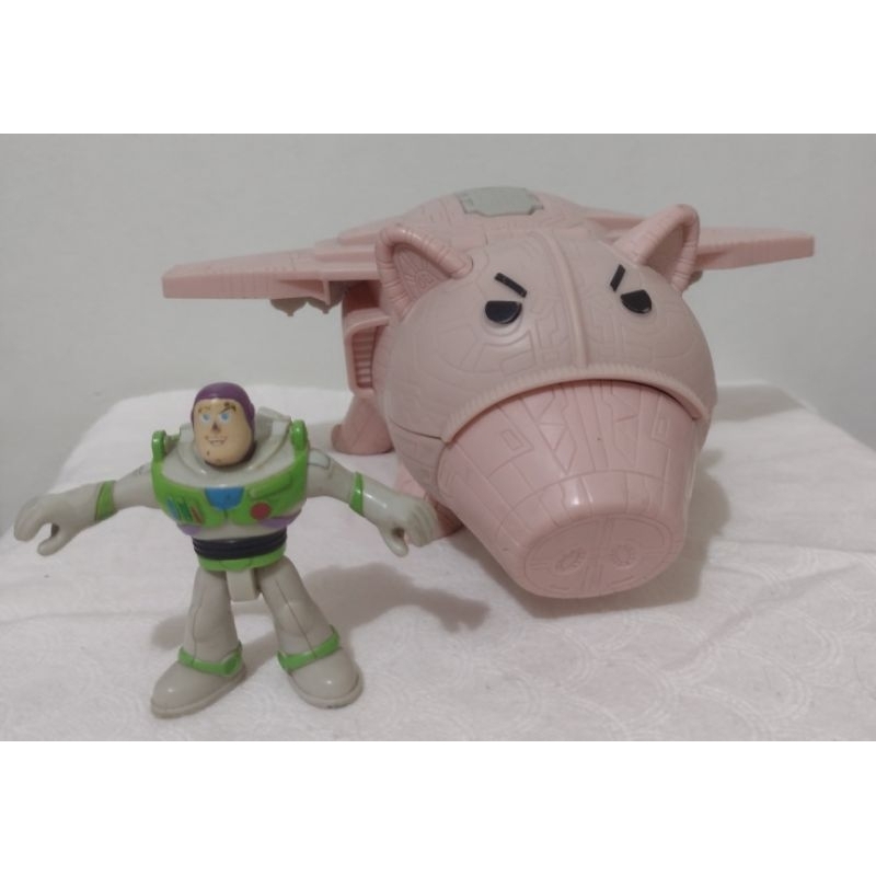 Boneco e nave espacial imaginex  porco
