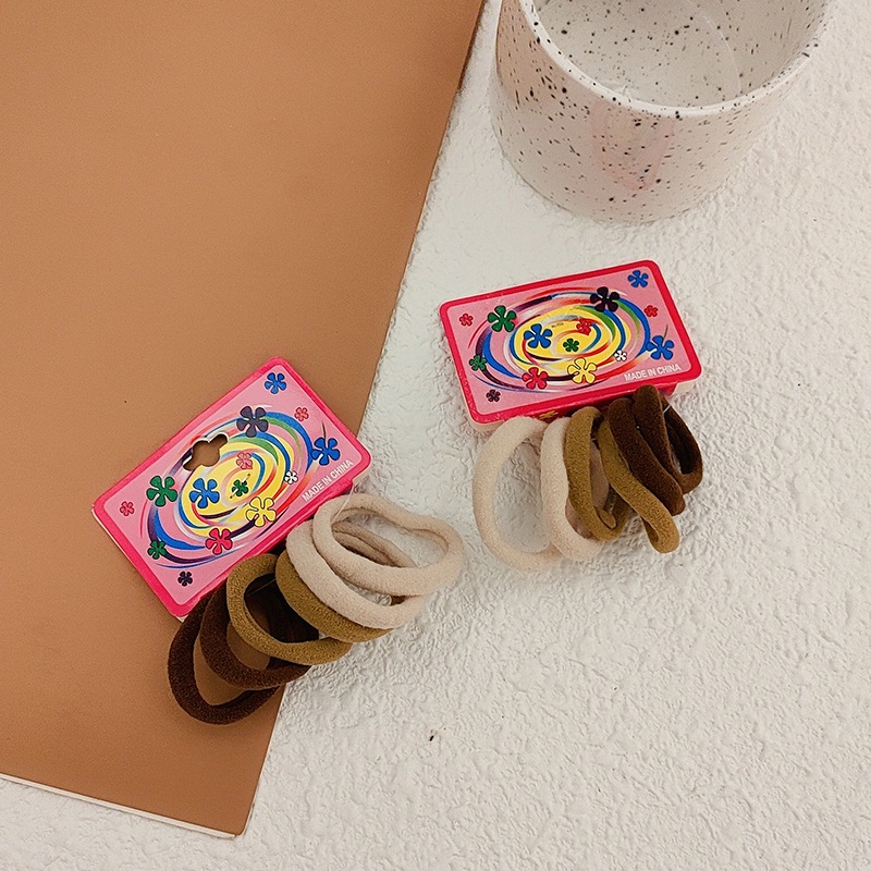 Elástico Rabicó Xuxinha marrom 72un tipo meia em Oferta na Shopee