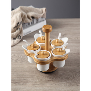 Porta condimentos giratória com 5 potes com colher de bambu em Oferta na Shopee