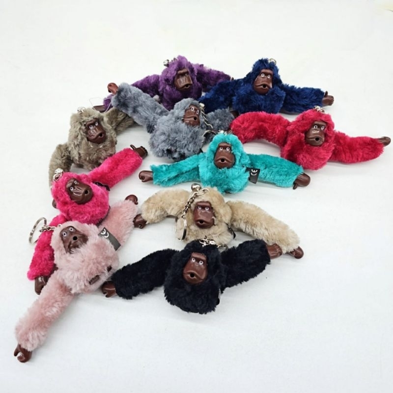 Chaveiro Macaquinho Pelúcia Varias Cores para pendurar Mochilas Bolsas Chaves em Oferta na Shopee