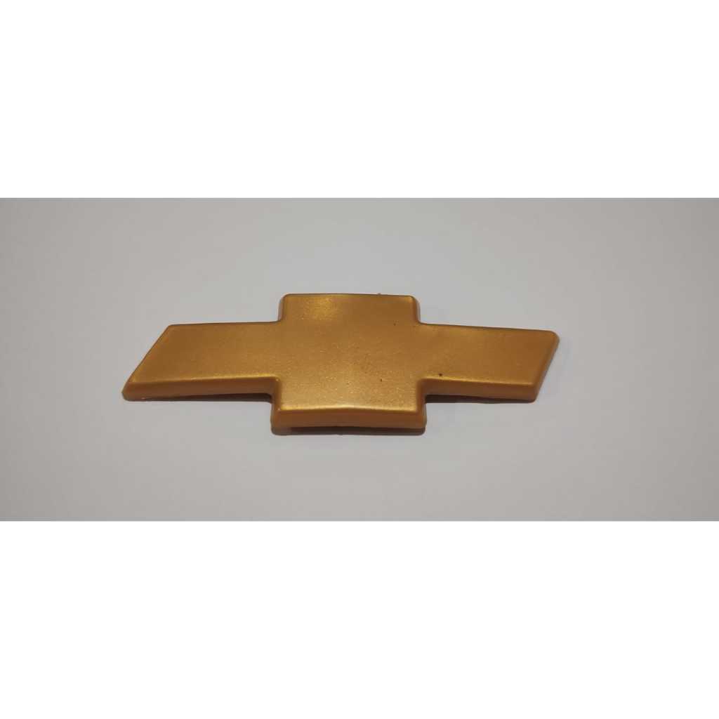 Emblema Aplique Gravata Dourada  Da Grade Astra 99 / 2010 Gravata Dourada