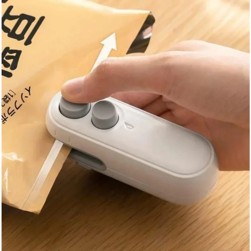 Mini Seladora 2 em 1 Portátil Recarregavel USB-C Com Imã - Corte e Sele Alimentos com Facilidade!