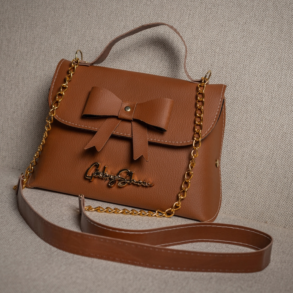 Bolsa Feminina Bauzinho Pequeno de Laço,Alça em Sintético e Corrente,Fechamento Magnético,Sintético PU.Gaby Show em Oferta na Shopee