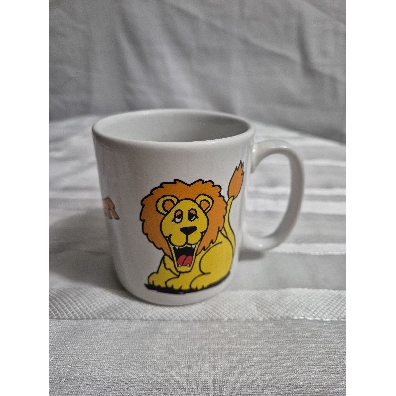 caneca em porcelana antiga pozzani C2547