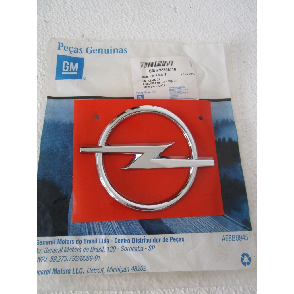 Emblema Opel para tampa do porta malas Chevrolet Novo Corsa Sedan (frente Montana) 2002 a 2012 original GM 93398718