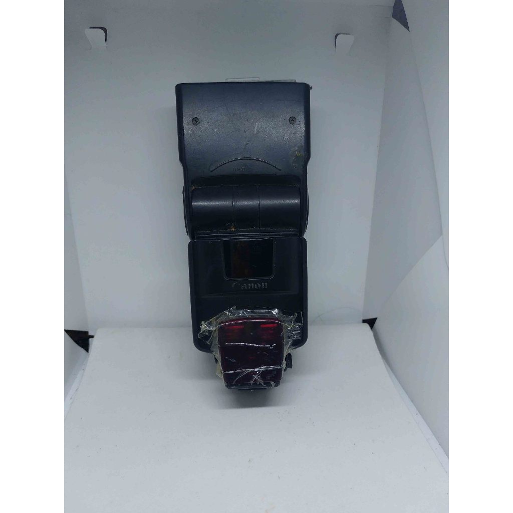 flash canon  com marcas de uso