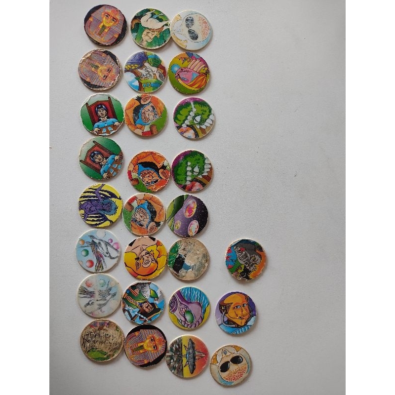 Tazos caps Buzzy monstro.