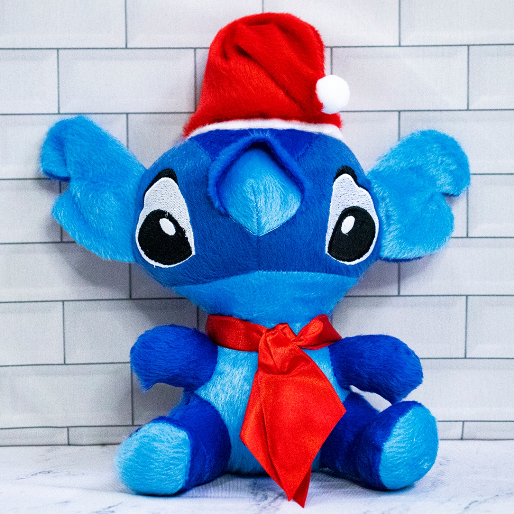 BONECO DE PELÚCIA STITCH DE NATAL COM TOUCA DE PAPAI NOEL