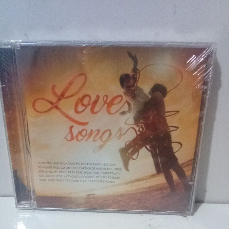 Cd Love Songs várias músicas True,Take My Breath Away,The Captain Of he Heart.... chover Versions Lacrado de Fabrica