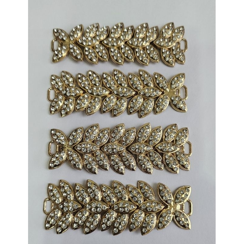 peça lateral metal  folhagem com strass vendido por (par) em Oferta na Shopee