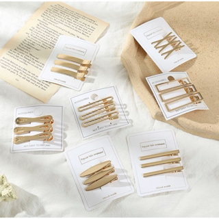 O kit contém 6 clipes de metal dourado modelo aleatoria em Oferta na Shopee