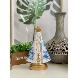 nossa senhora aparecida 22 cm  manto de flor azul detalhes dourado gesso em Oferta na Shopee