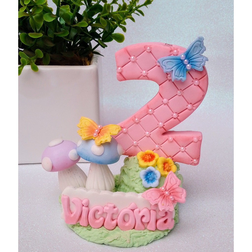 Vela aniversario biscuit borboletas em Oferta na Shopee