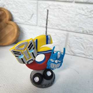 Vela Em Biscuit Transformers Bumblebee E Optimus em Oferta na Shopee