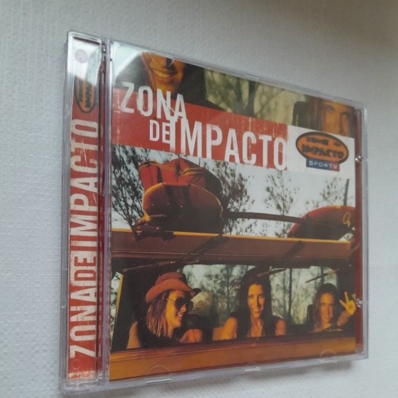 CD Zona De Impacto - Creed Black Crowes Silverchair Bad Religion Joe Satriani Jamiroquai Fatboy Slim Men At Work Oasis