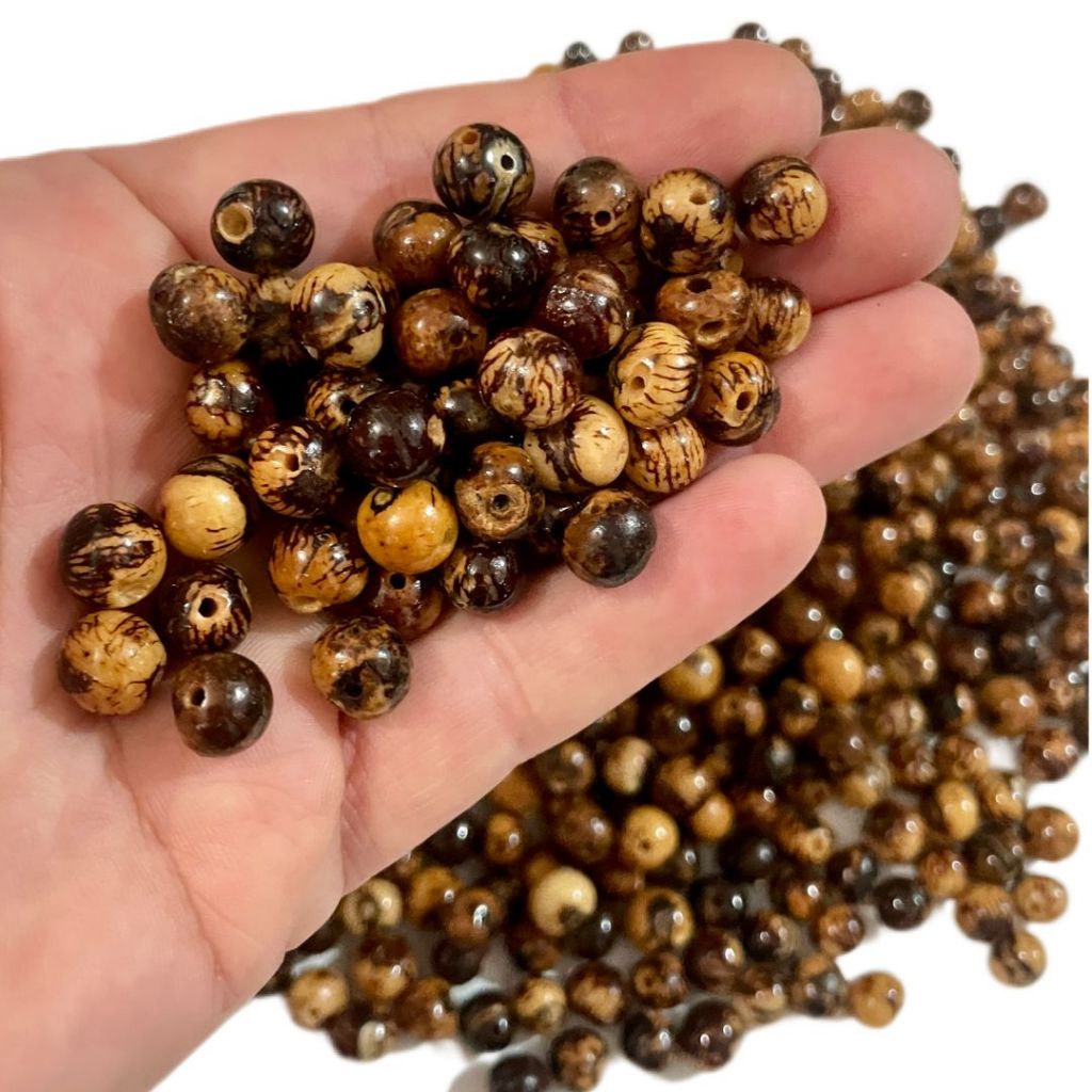 Imagem Semente de açai Natural com Furo pct 1000 unidades Miçanga Japamala