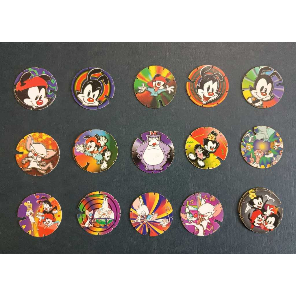 Mega Tazo Arma e Voa - Animaniacs (1997) – Lote Completo com 17 Tazos Raros