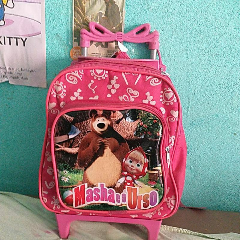 Mochila macha e o urso usada