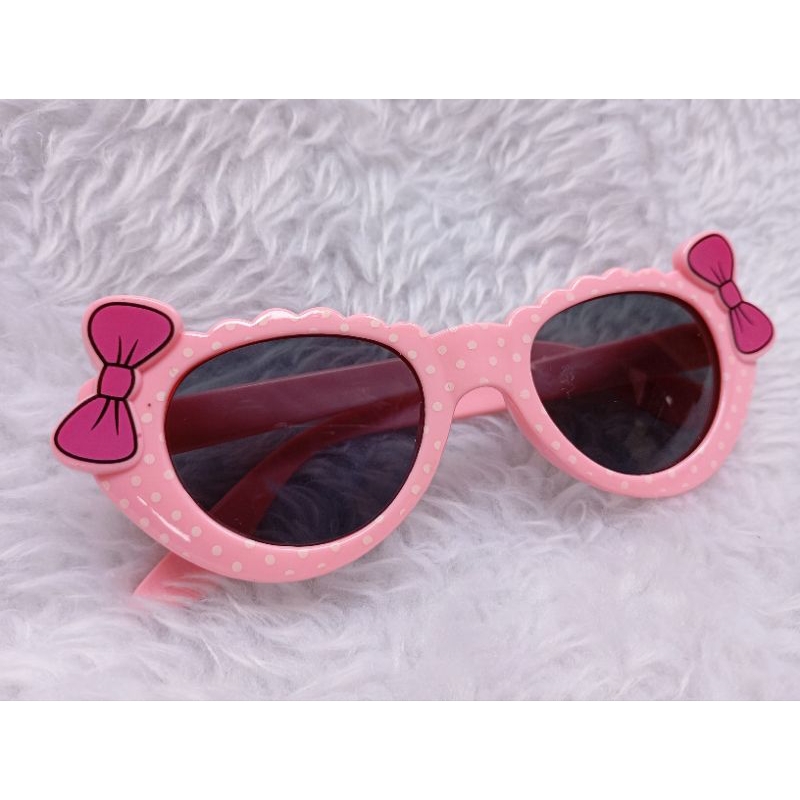 Óculos de sol infantil moda lacinho rosa em Oferta na Shopee