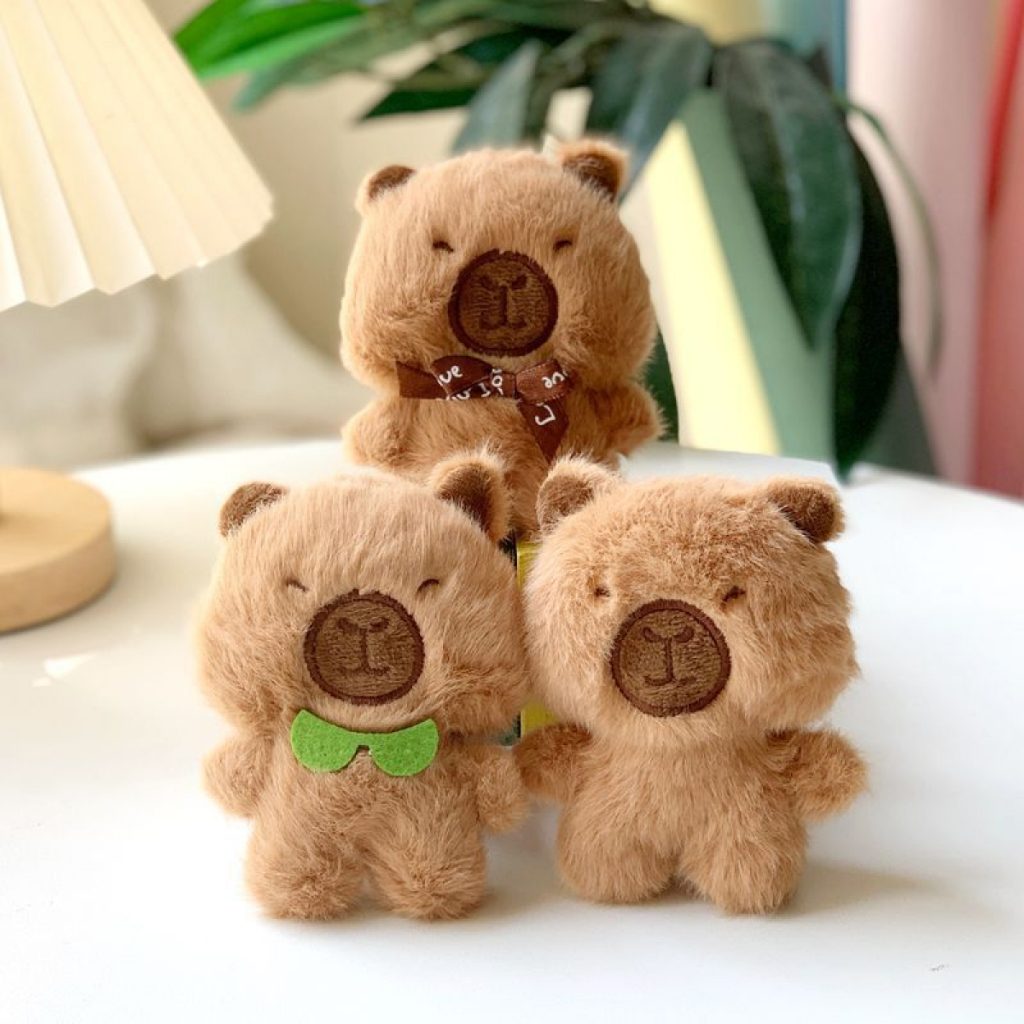 Kit 12 Chaveiro de pelúcia Capivara com pingente tamanho 12cm chaveiro para Mochila em Oferta na Shopee