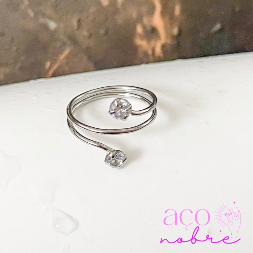 Anel De Festa Em Aço Inox Trançado Com 2 Zircônias em Oferta na Shopee