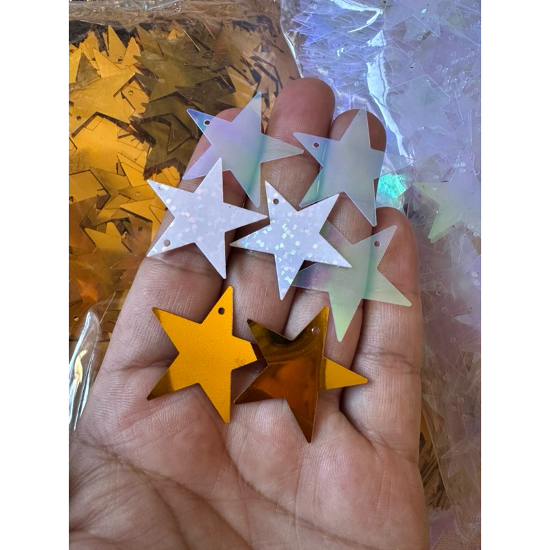 Paete estrela 30mm em pvc com furo-50grs em Oferta na Shopee