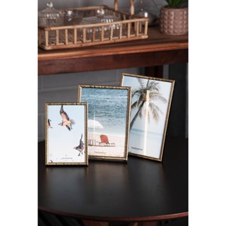 Porta-Retrato Wolff Spiral de Aço Inox Dourado 15cm x 20cm em Oferta na Shopee