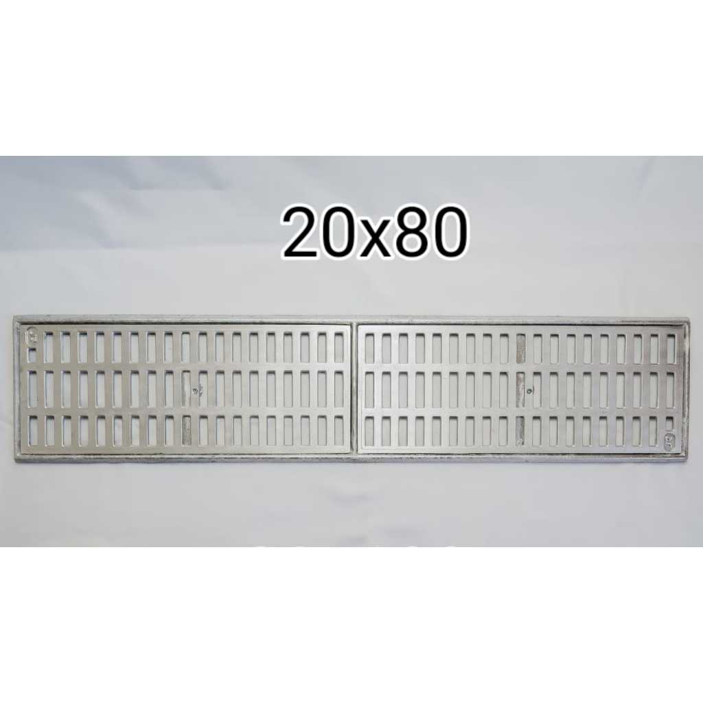 ralo linear 20x80 cm em aluminio fundido com tela anti- inseto e parafuso anti-furto que suporta passagem de veiculos