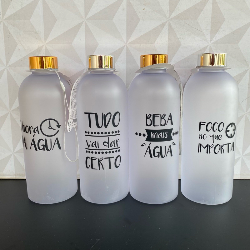 Garrafa / garrafinha de água de plástico com frase motivacional  - 1 litro de agua com alça e tampa de plastico squeeze