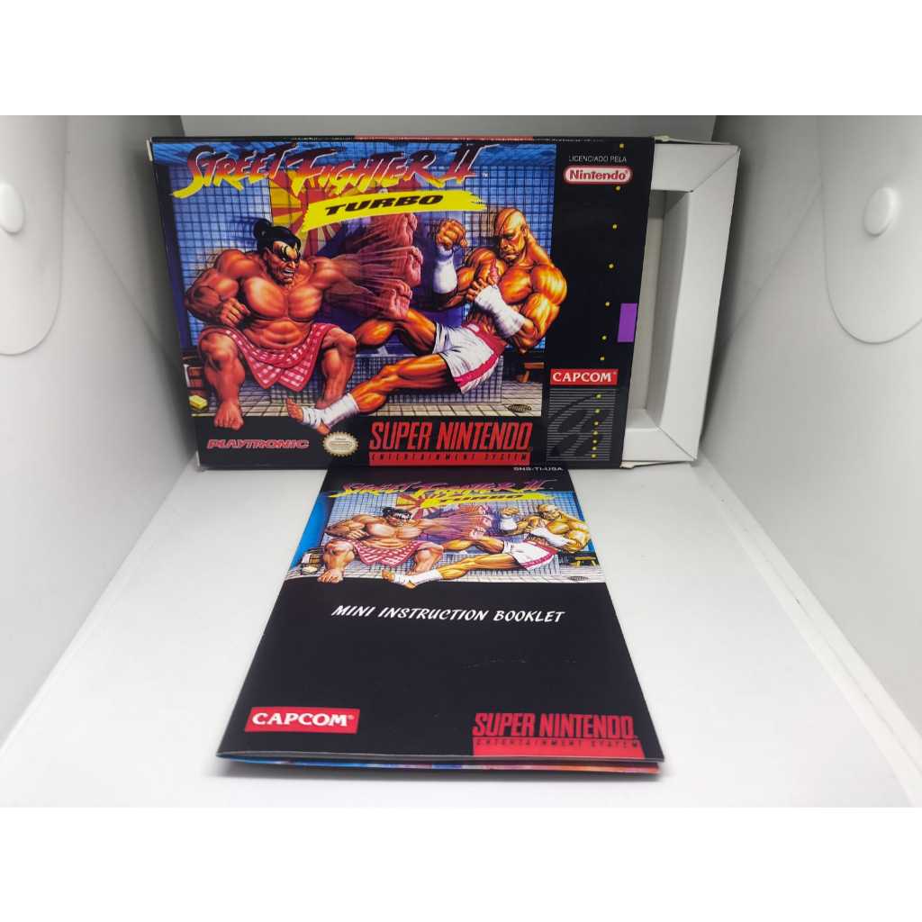 Caixa do Jogo Street Fighter 2 Turbo para Super Nintendo - Inclui Berço e Mini Manual Poster