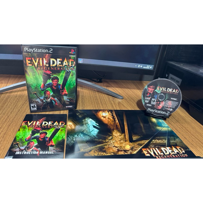 Evil Dead Regeneration com Manual/Pôster para PS2