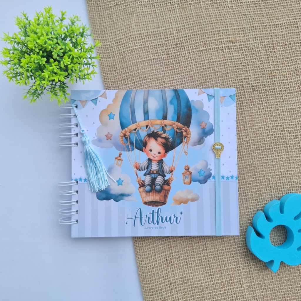 Livro do bebê - Menino no balão