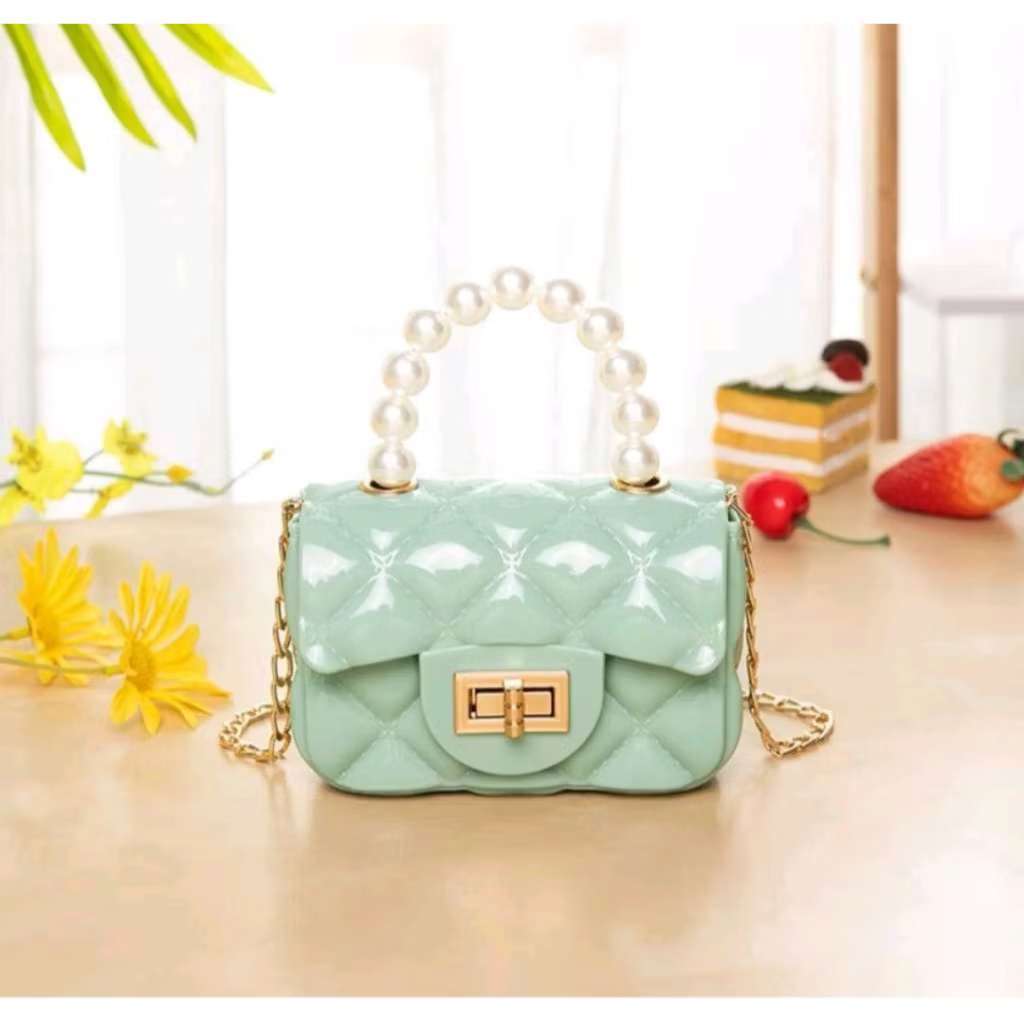 Bolsa infantil silicone Jelly blogueirinha em Oferta na Shopee