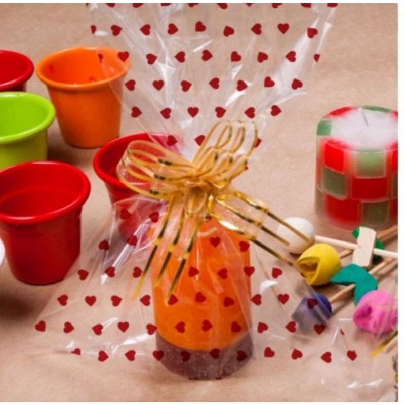 50 sacos de celofane transparente e decorado diversos tamanhos em Oferta na Shopee