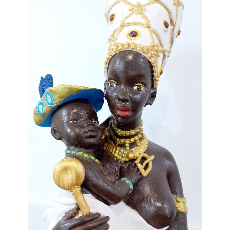 IMAGEM OXUM COM LOGUN EDÉ.NOS BRAÇOS