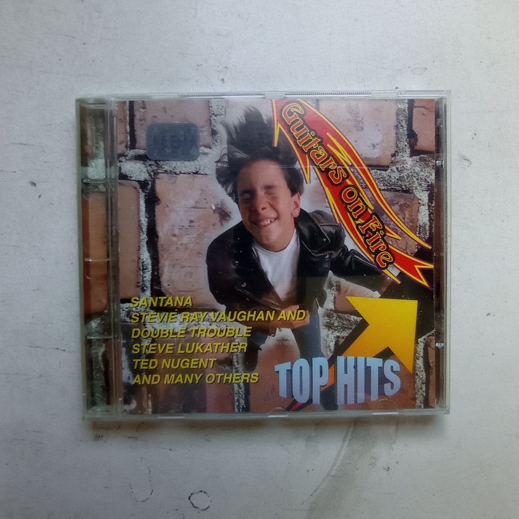 CD Guitars On Fire - Top Hits - Carlos Santana / Stevie Ray Vaughan
