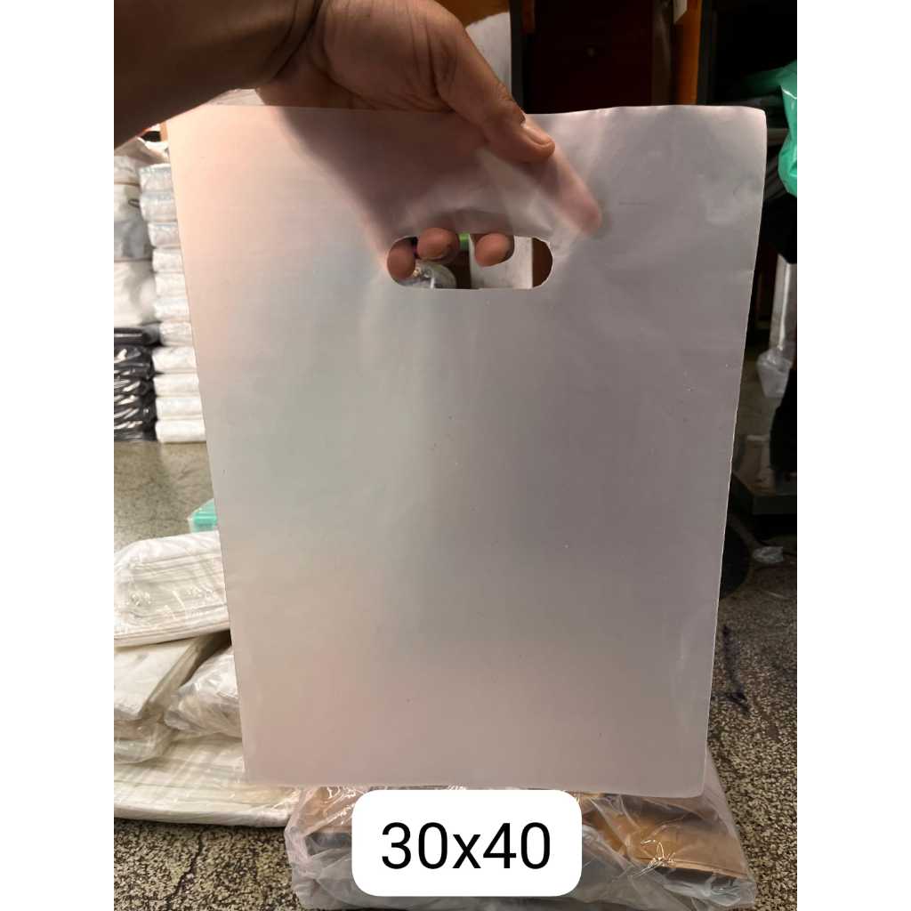 Kit Sacola Plástica Alça Vazada Transparente Tr Com 100 Unidades Tratada Para Serigrafia em Oferta na Shopee