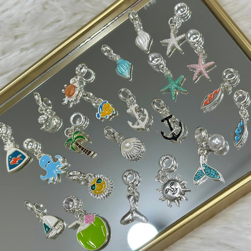 Berloques fundo do mar, concha do mar com pérola, cauda de sereia, estrela do mar, âncora, água de coco, prancha de surf em Oferta na Shopee