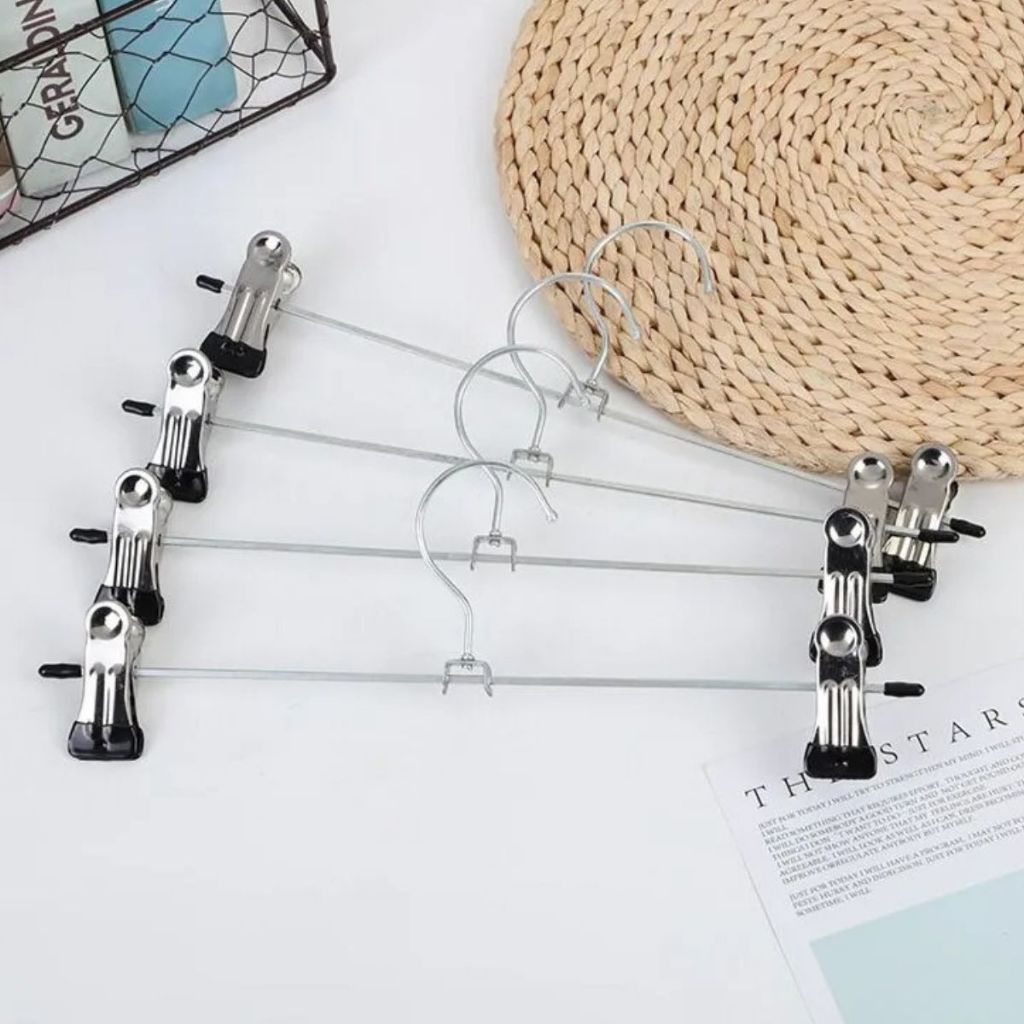 Kit 50 Cabides Cromado Com Presilhas-Calcas, Saia ou Bermuda em Oferta na Shopee