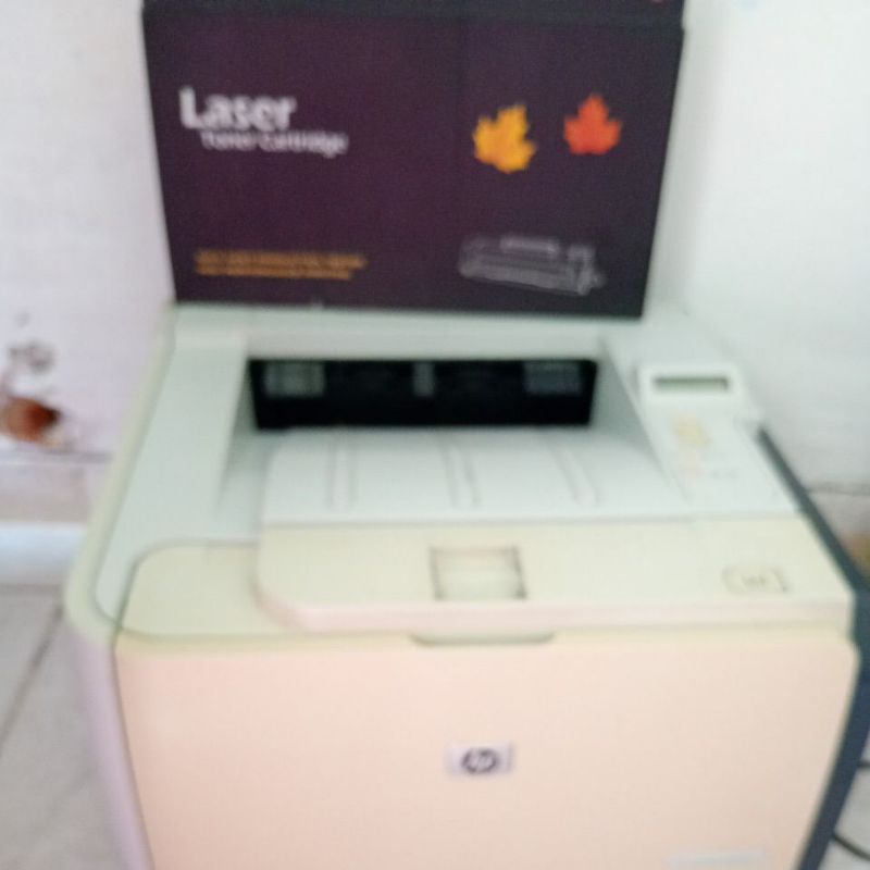 impressora laser da hp  2035 monocromatica  vai com toner novo p imprimir documentos