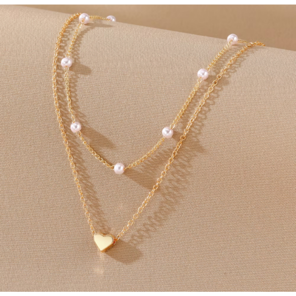 Conjunto gargantilha de pérolas e colar com pingente de coração (2 peças)