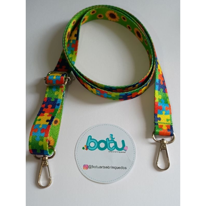 Alça regulável símbolo autismo. Autismo alça. Alça autismo