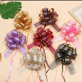 laço flor sortidos pacote com 5unidades tamanho 30 em Oferta na Shopee