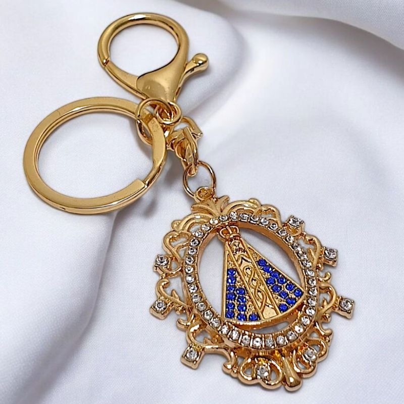 Chaveiro Nossa Senhora Aparecida Folheado Com Mosquete e Strass