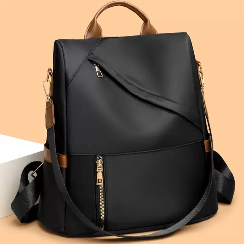 Modelo 019 – Bolsa feminina  à prova d’água e antifurto  ideal para escola trabalho e viagens. — imagem 1