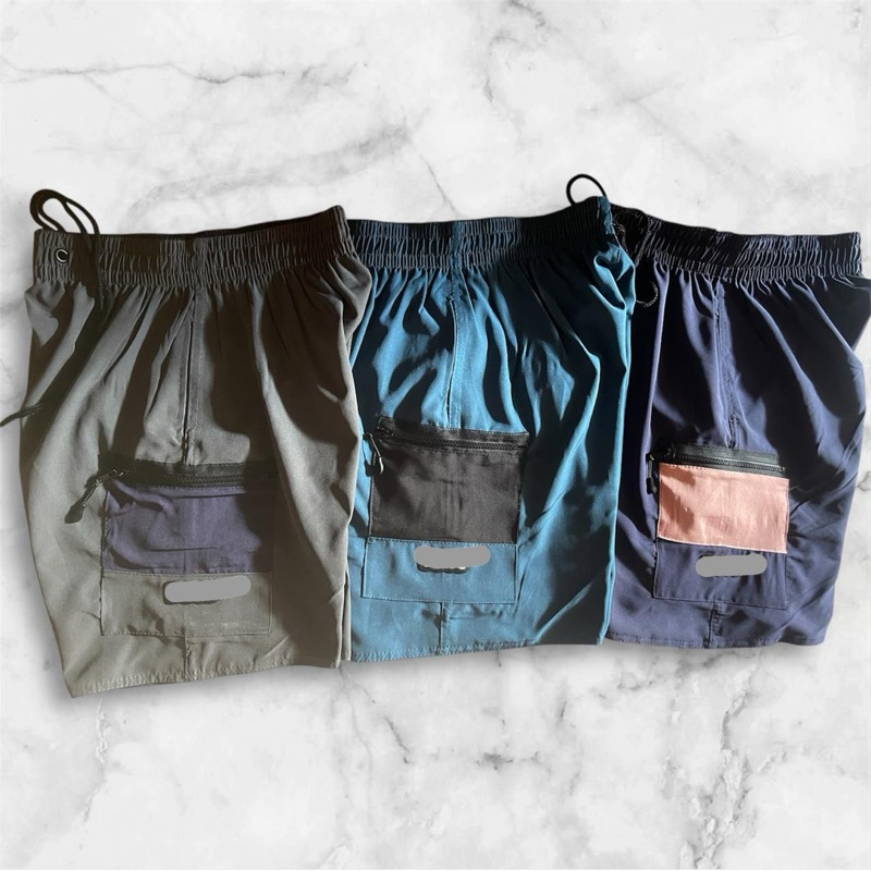 kit de bermudas com 3 peças variadas de elastano com o bolso cargo com ziper